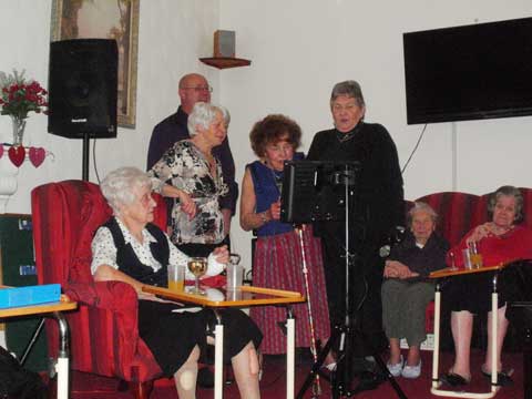 wider view of same group interacting with one another